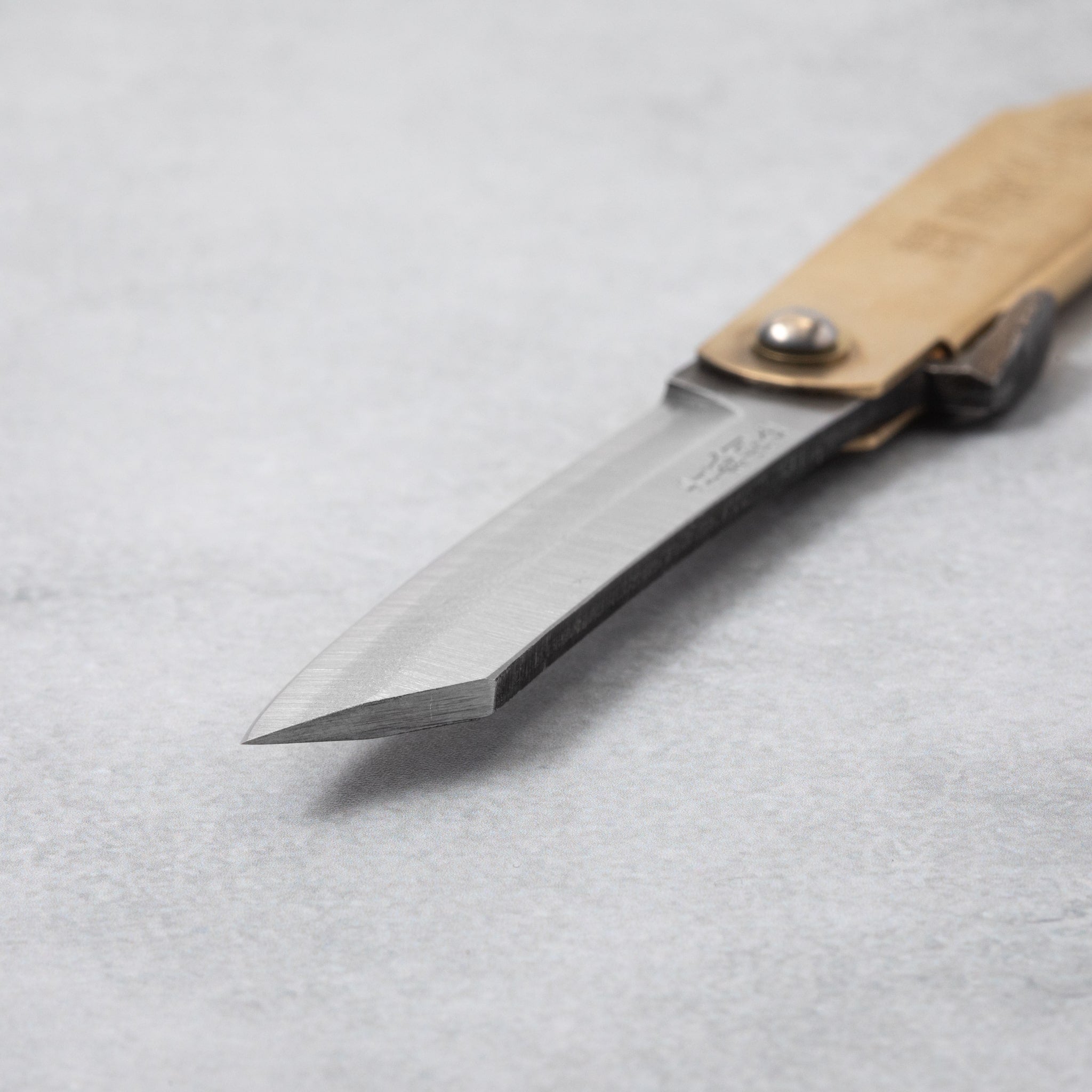 Blade tip of Higonokami Blue Super Steel Clad Medium Folding Knife