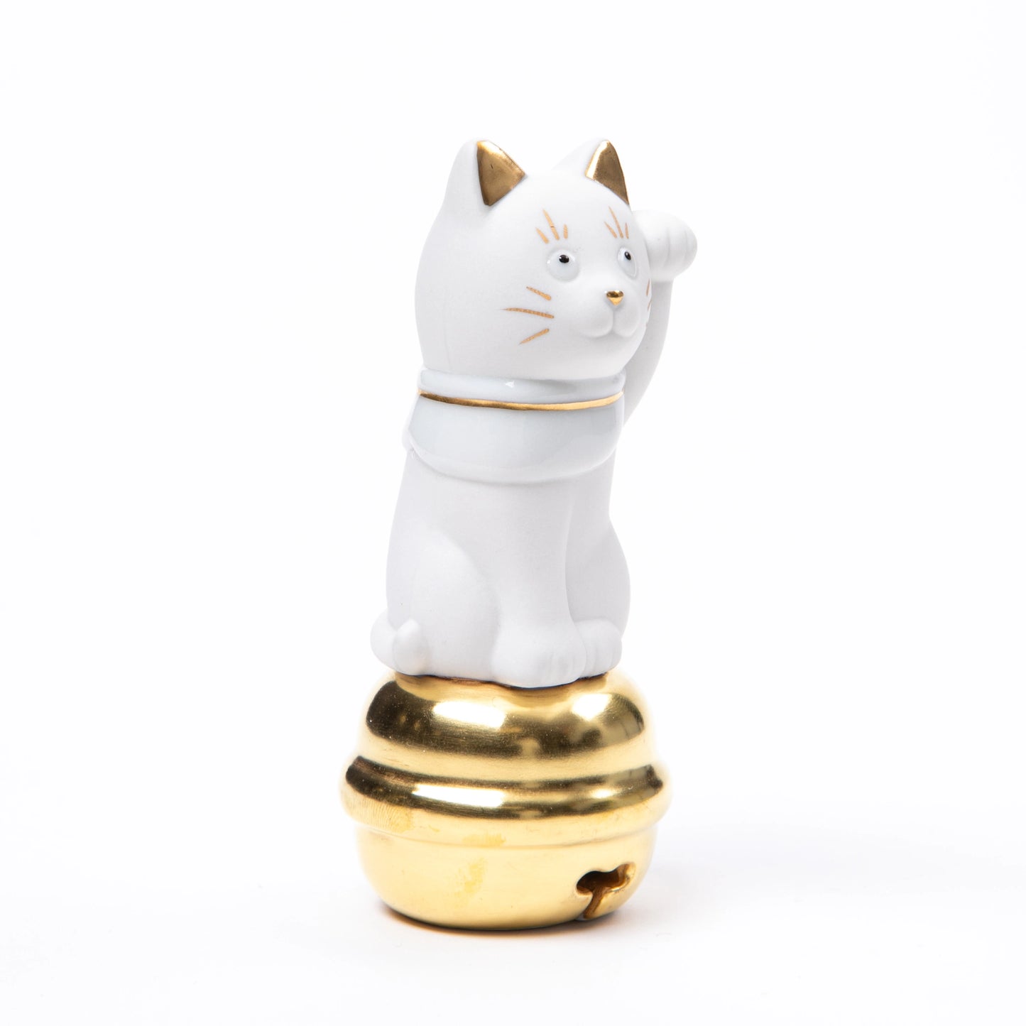 A side profile of the Choemon Kiln Kutani Maneki Neko, highlighting its delicate porcelain craftsmanship and intricate gold detailing on the face and collar.