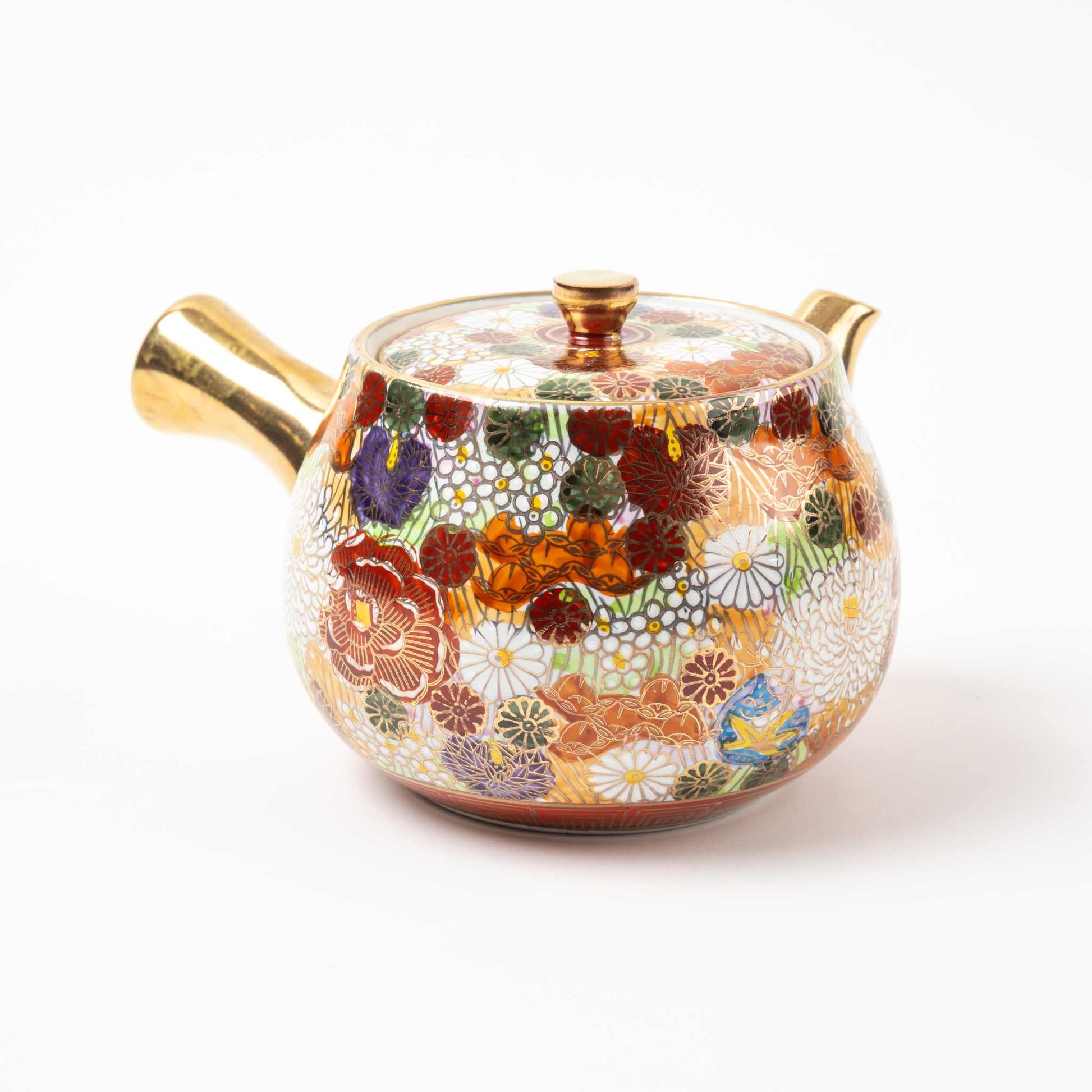 Kutani teapot with floral decorations and a golden spout from the Blooming Flowers Tea Set, part of handcrafted Japanese teaware.