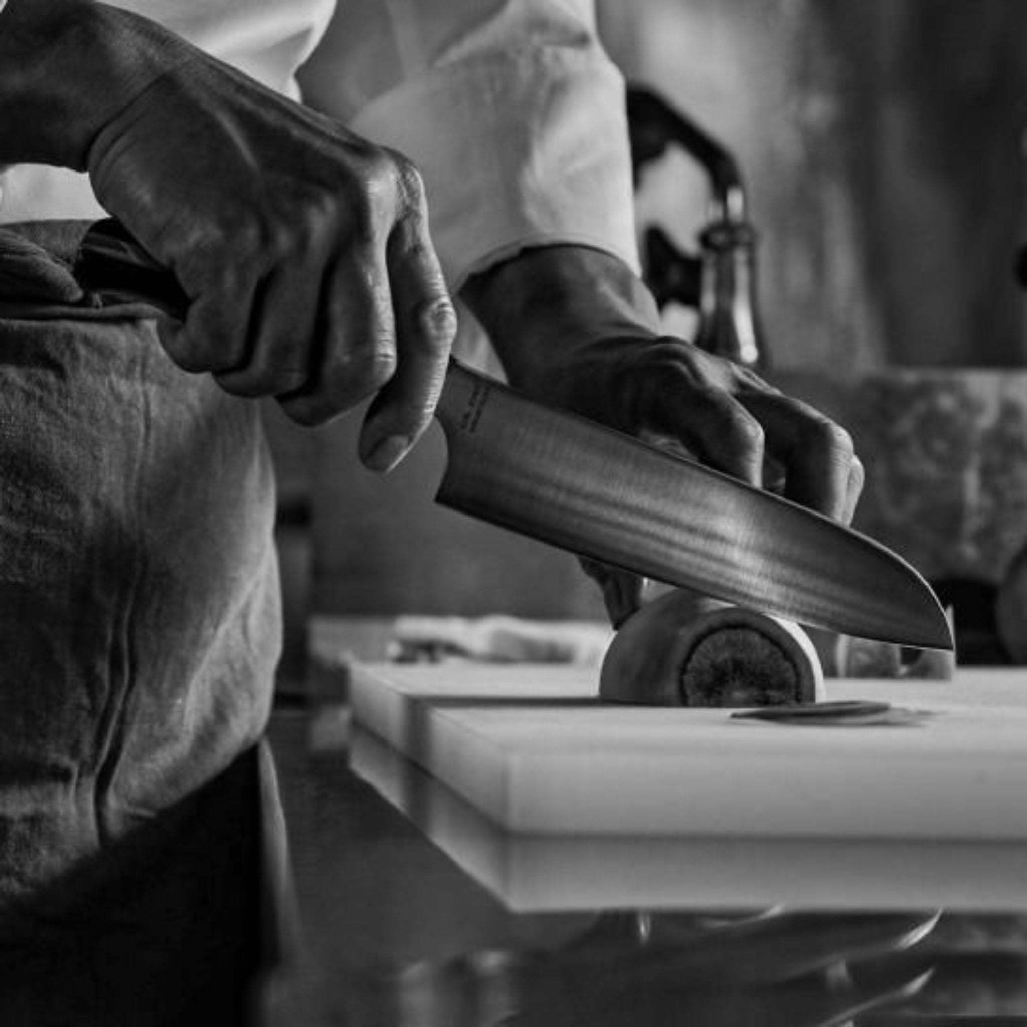 Chef cutting with Japanese Knife from Mitsuboshi Cutlery