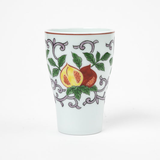 Front view of a Gen-emon porcelain cup with a colorful pomegranate design, featuring a split-open fruit surrounded by green leaves and delicate swirling vines, highlighting the craftsmanship of Japanese porcelain art.