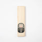 Closed paulownia gift box with a black Daruma illustration for Hyozaemon lacquer chopsticks.