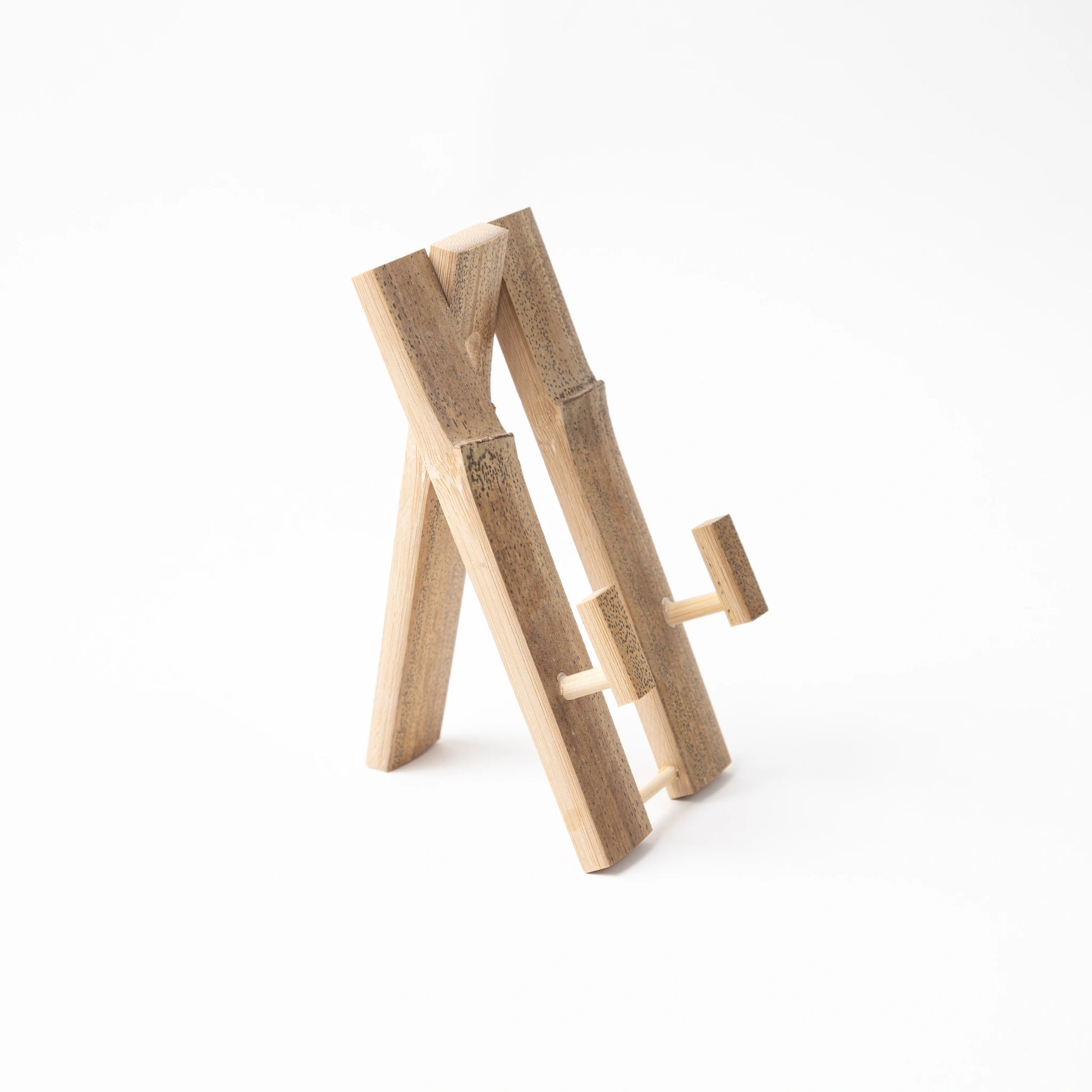 A wooden fan stand from Ibasen, displayed at an angle, highlighting its A-frame structure and adjustable support bar.