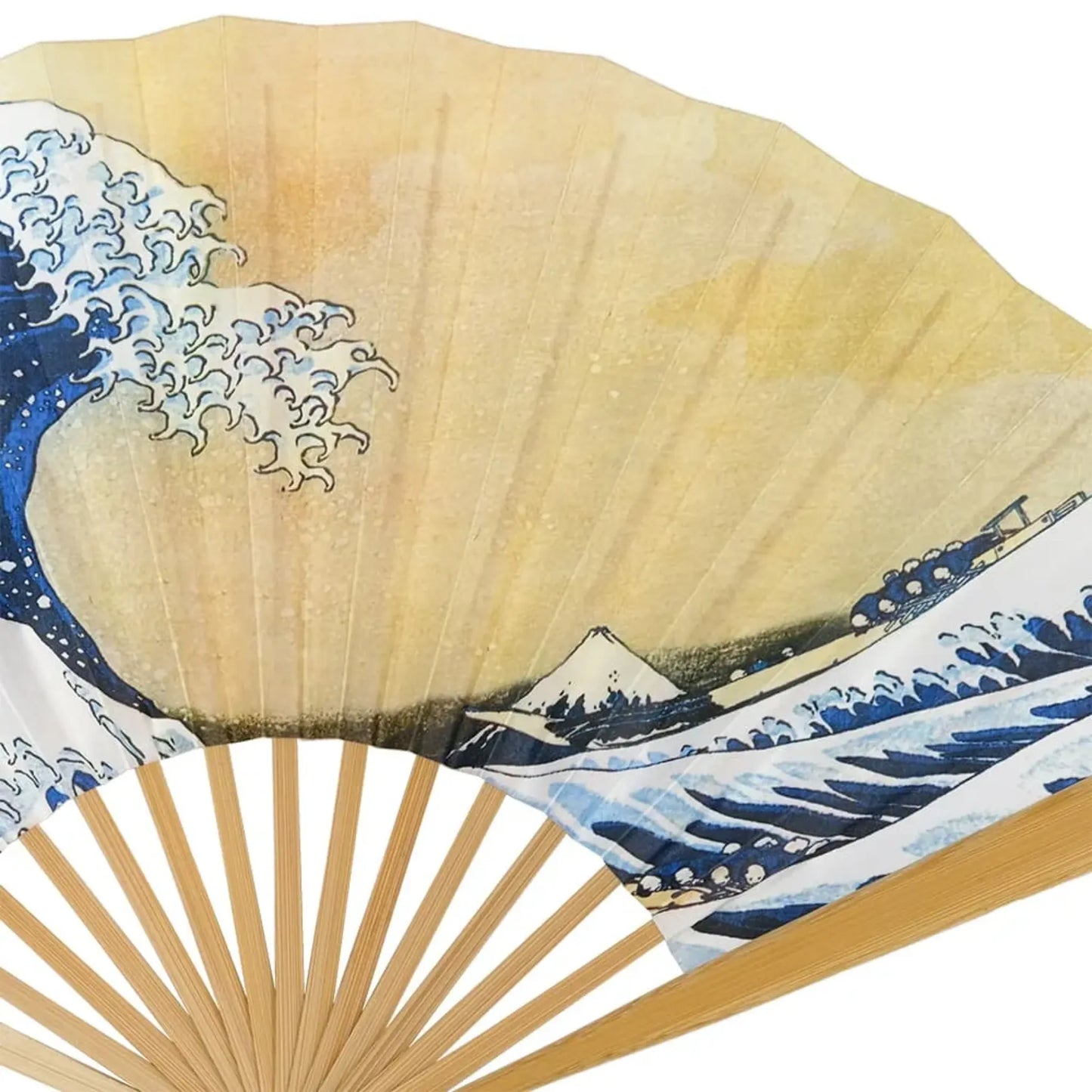 The serene scene of Mount Fuji beneath a golden sky, framed by rolling waves, presented on the right side of the fan.