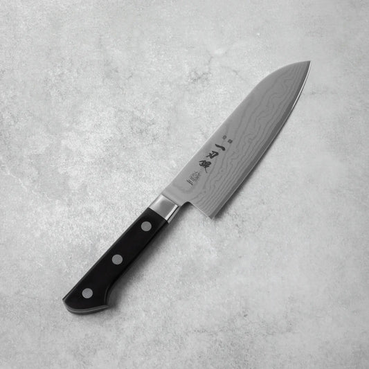 A full view of the Ittoutan Kiageha Santoku knife, featuring its distinctive wide blade shape.