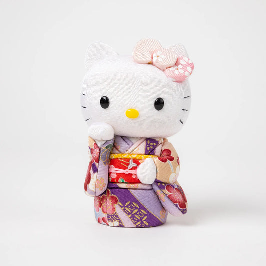 Front view of the Edo Kimekomi Kimono Maneki Hello Kitty Pink, featuring Hello Kitty in a traditional Japanese kimono with a pink floral pattern and a decorative bow on her head.