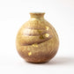 Close-up of the Kutani Gold Leaf Sake Bottle with rustic design and intricate gold leaf detailing.