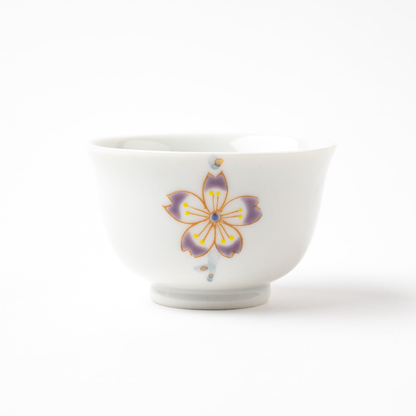 Cherry blossom adorned tea cup from Kutani Japanese Sakura tea set