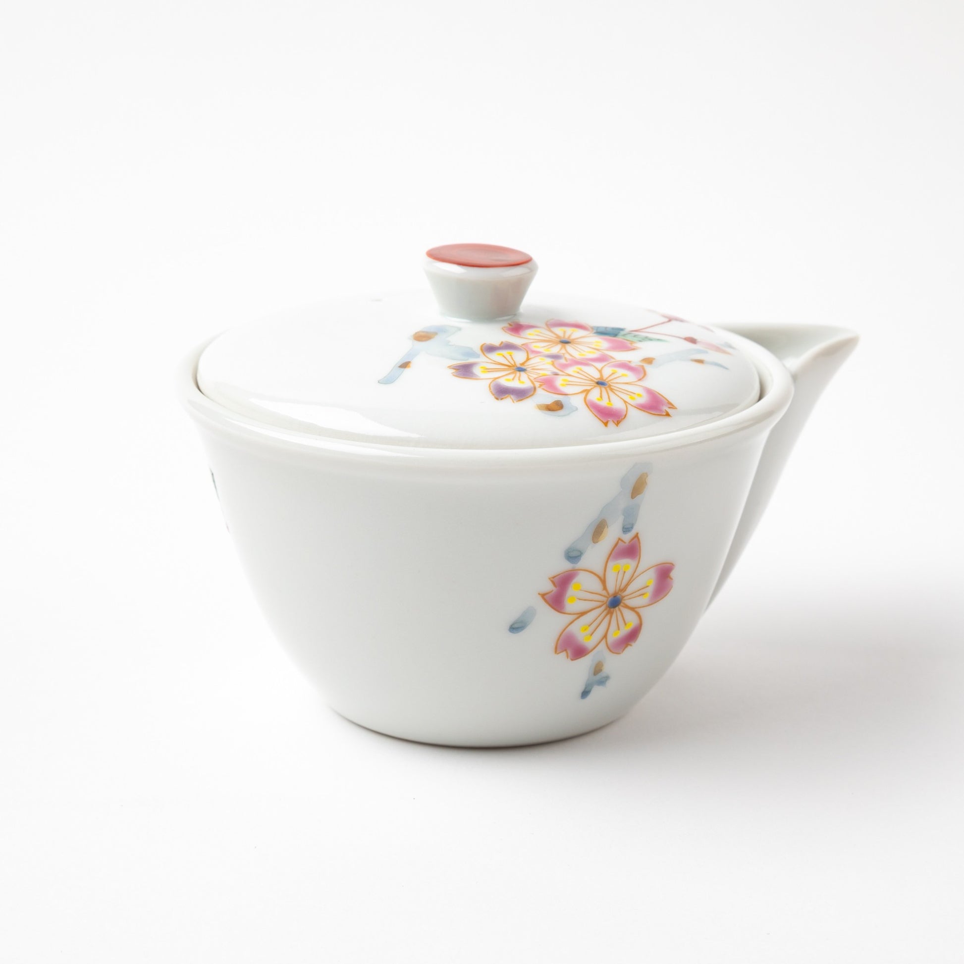 Kutani Japanese Sakura tea set, showcasing floral pattern