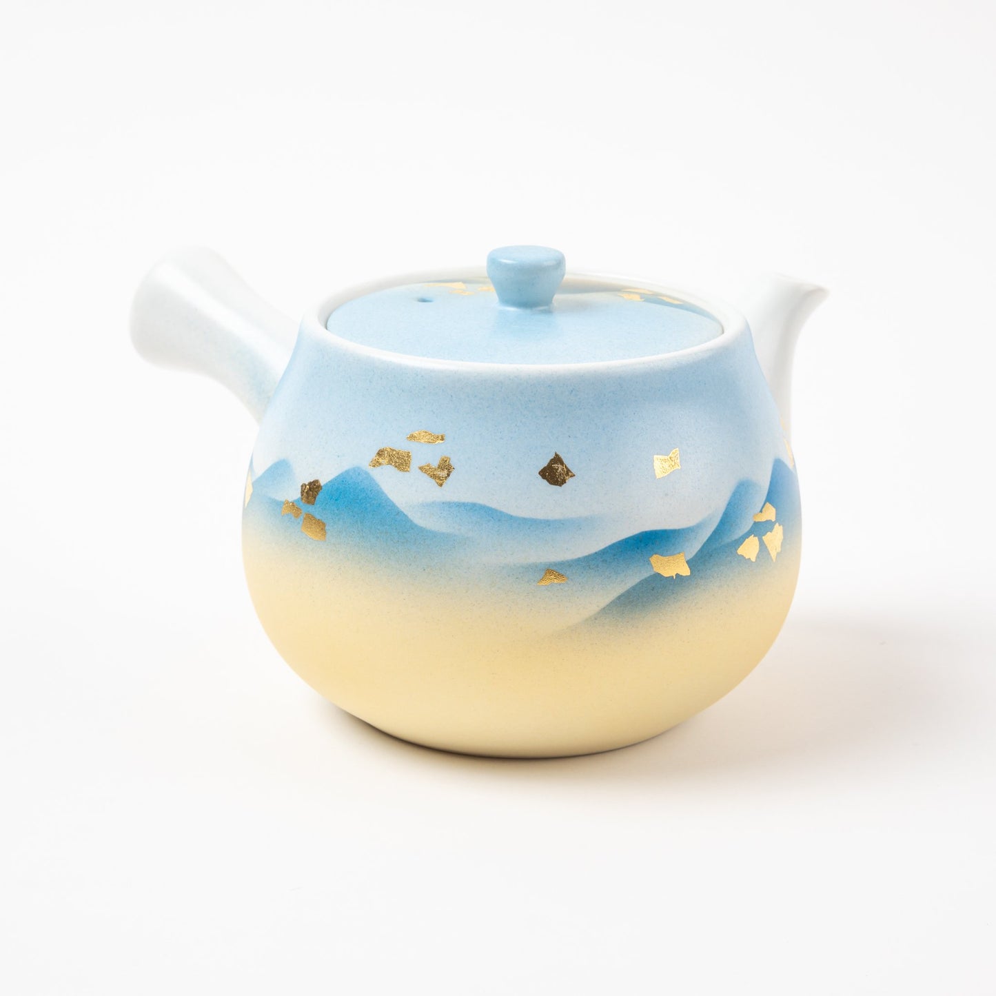 Kutani Mountain Range teapot featuring a gradient of blue to yellow with gold leaf accents