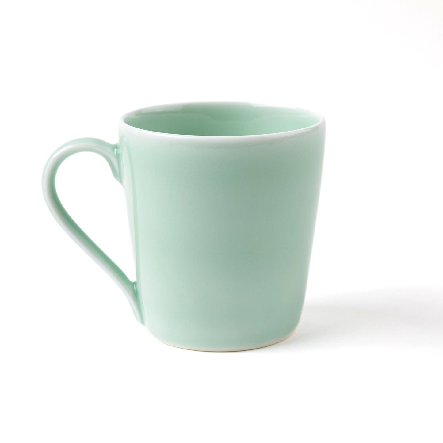 Nabeshima Celadon Porcelain Camellia Carved Mug