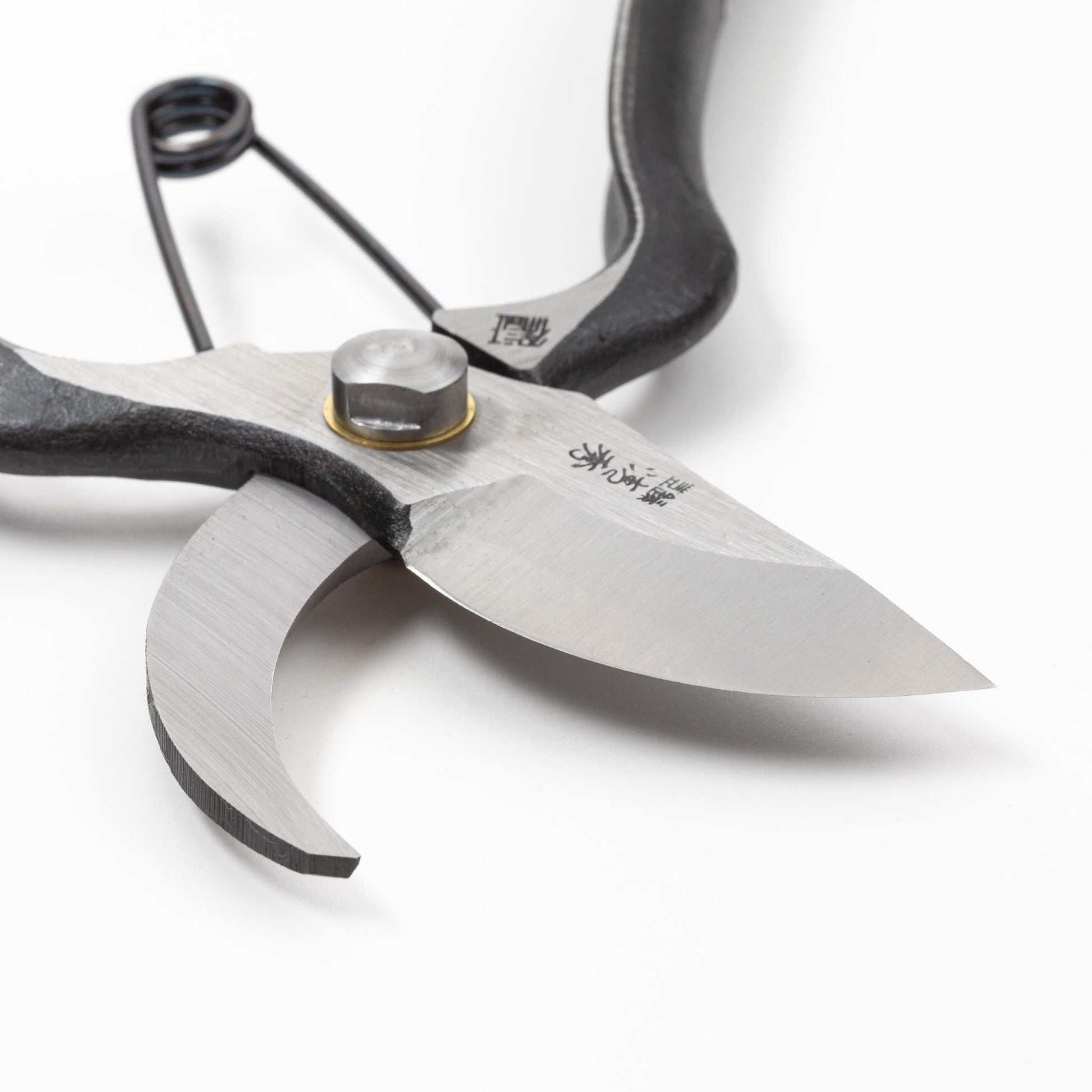 Tsurumaki pruning shears with a gold stop for added safety, offering sharp, precise cuts - premium Japanese gardening tool.