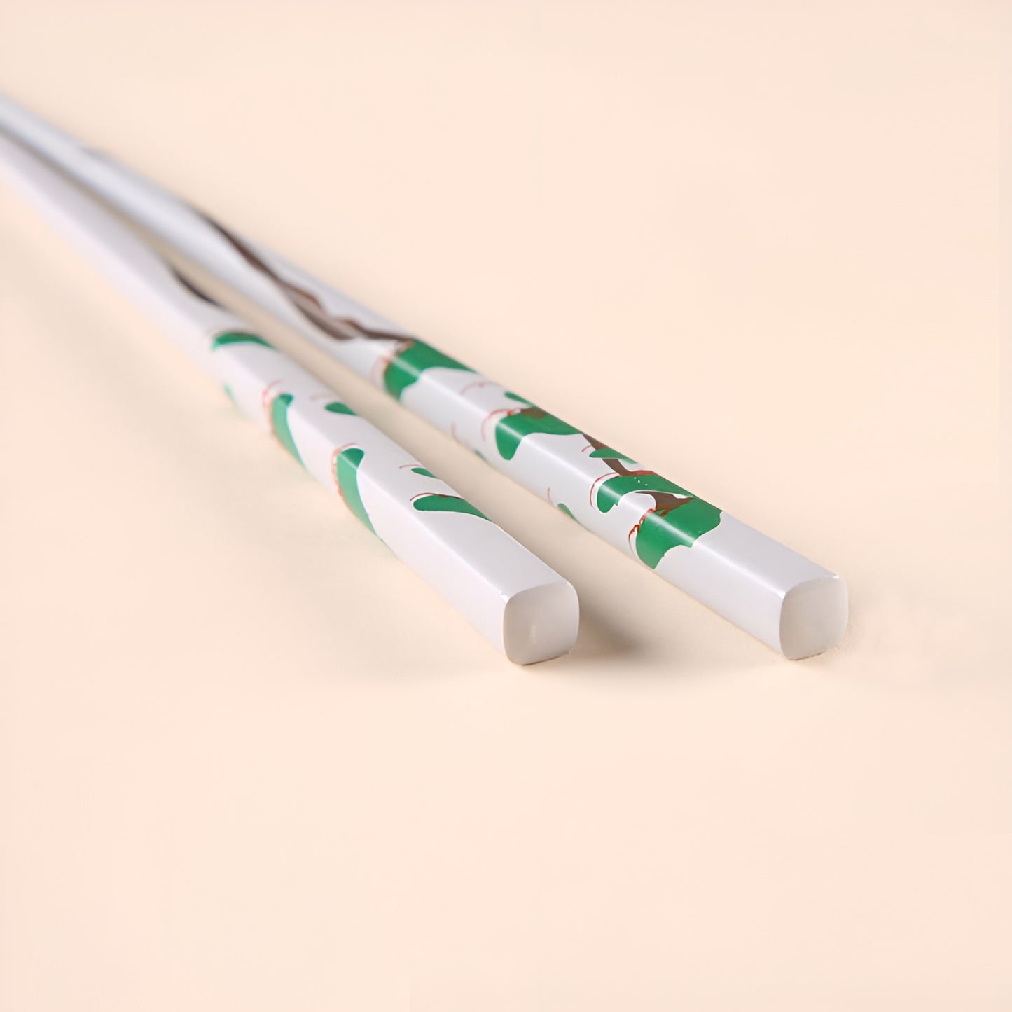 close up of Rimpa Pine and Bamboo Wakasa Lacquer Chopsticks in white