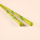 Close up of Rimpa Pine and Bamboo Wakasa Lacquer Chopsticks in lime green