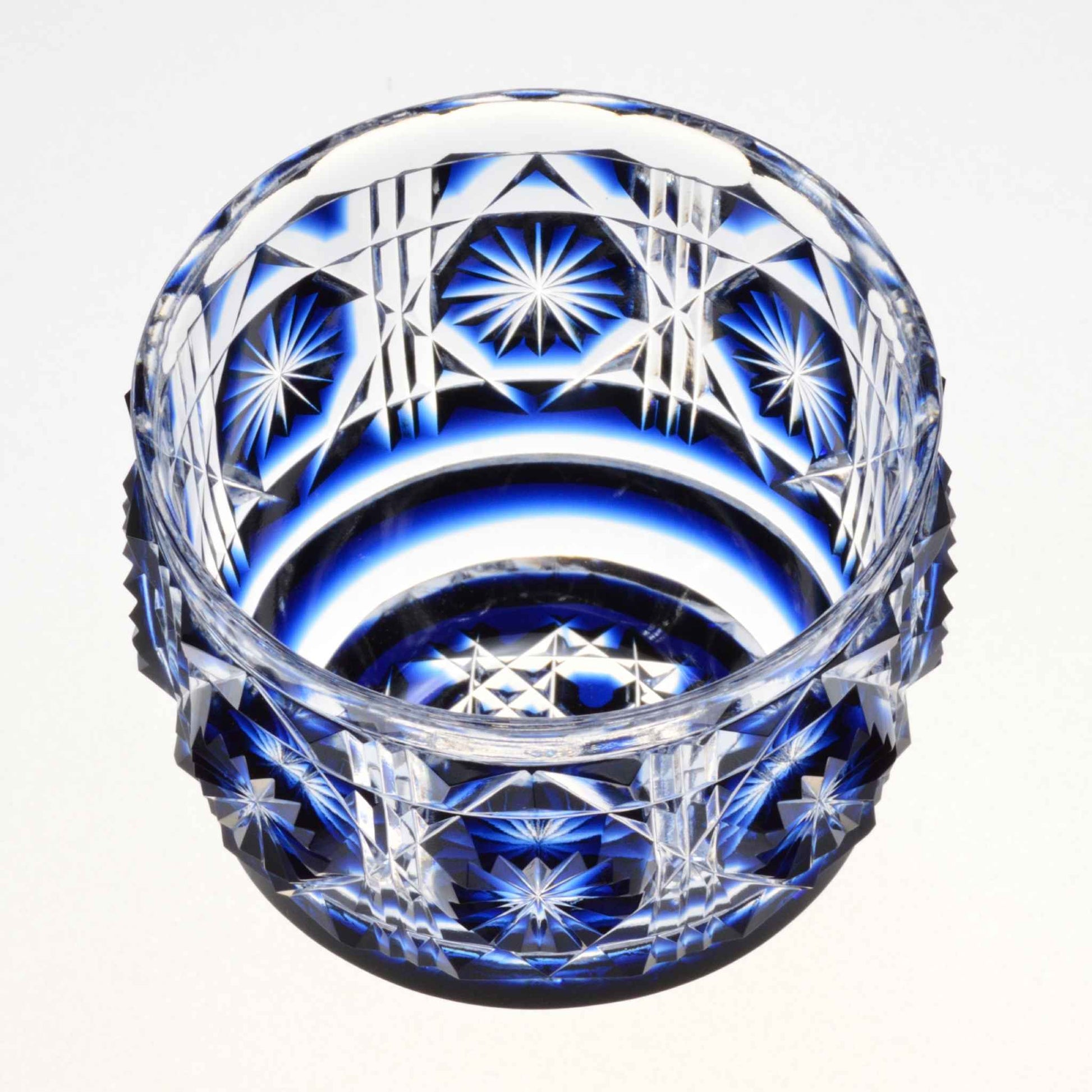 Indigo Satsuma Kiriko large sake cup featuring detailed starburst and geometric patterns.