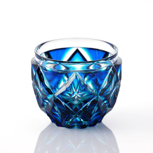 Side view of Satsuma Kiriko Lapis Green sake cup with detailed craftsmanship and bold color gradients.