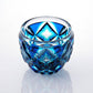 Elegant Satsuma Kiriko Lapis Green sake cup displaying vibrant blue-green tones and geometric crystal cuts.