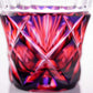 Side view of Satsuma Kiriko two-tone sake cup with a mesmerizing red and purple reflective surface.