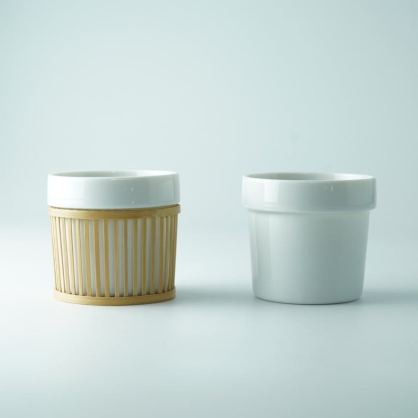 Side-by-side comparison of two Sen Bamboo Sleeve Cups, one with a bamboo sleeve and one without, against a light background.