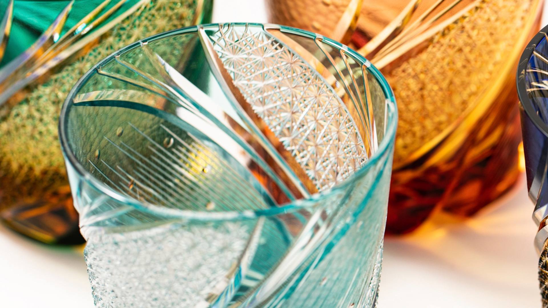 Close-up of Edo Kiriko glassware showcasing intricate cuts and vibrant colors