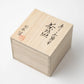 Wooden presentation box with Japanese calligraphy, showcasing the Karako and Sankirai Matcha Bowl’s elegant packaging.
