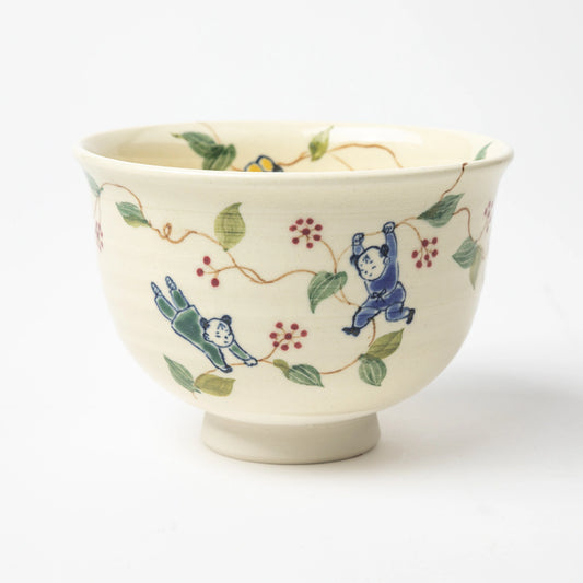 Side view of the Karako and Sankirai Matcha Bowl, highlighting the vibrant hand-painted design of vines and Karako figures.