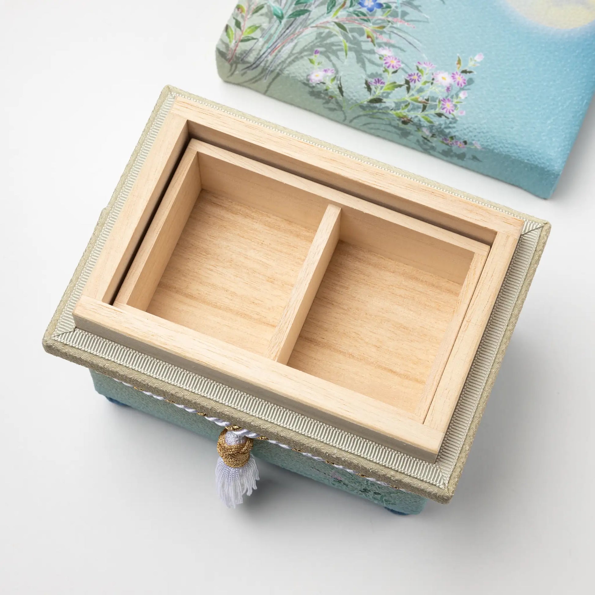 Overhead view of the open Kaga Yuzen Autumn Night Accessory Box, displaying the natural wood compartments inside for organized storage.