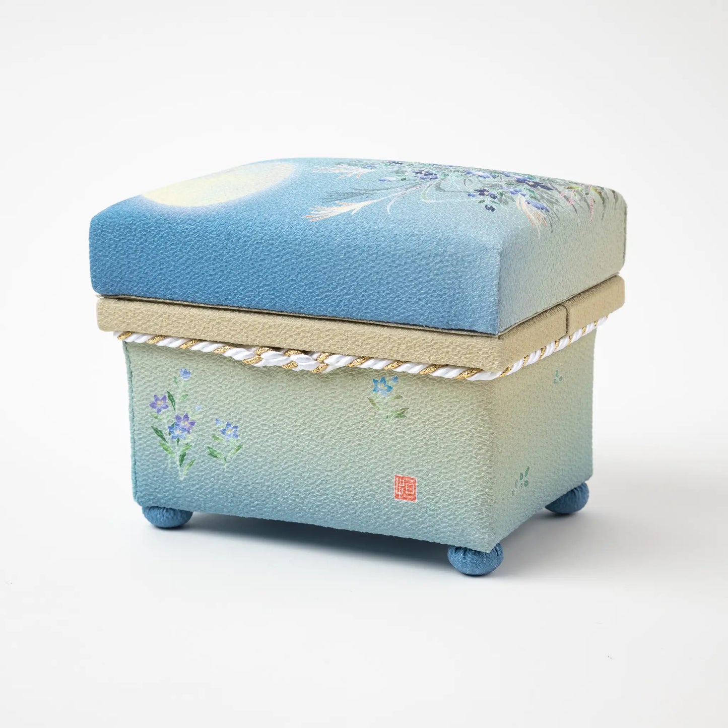 Side view of the Kaga Yuzen Autumn Night Accessory Box, showing the delicate floral design in pastel colors, evoking a peaceful autumn scene.