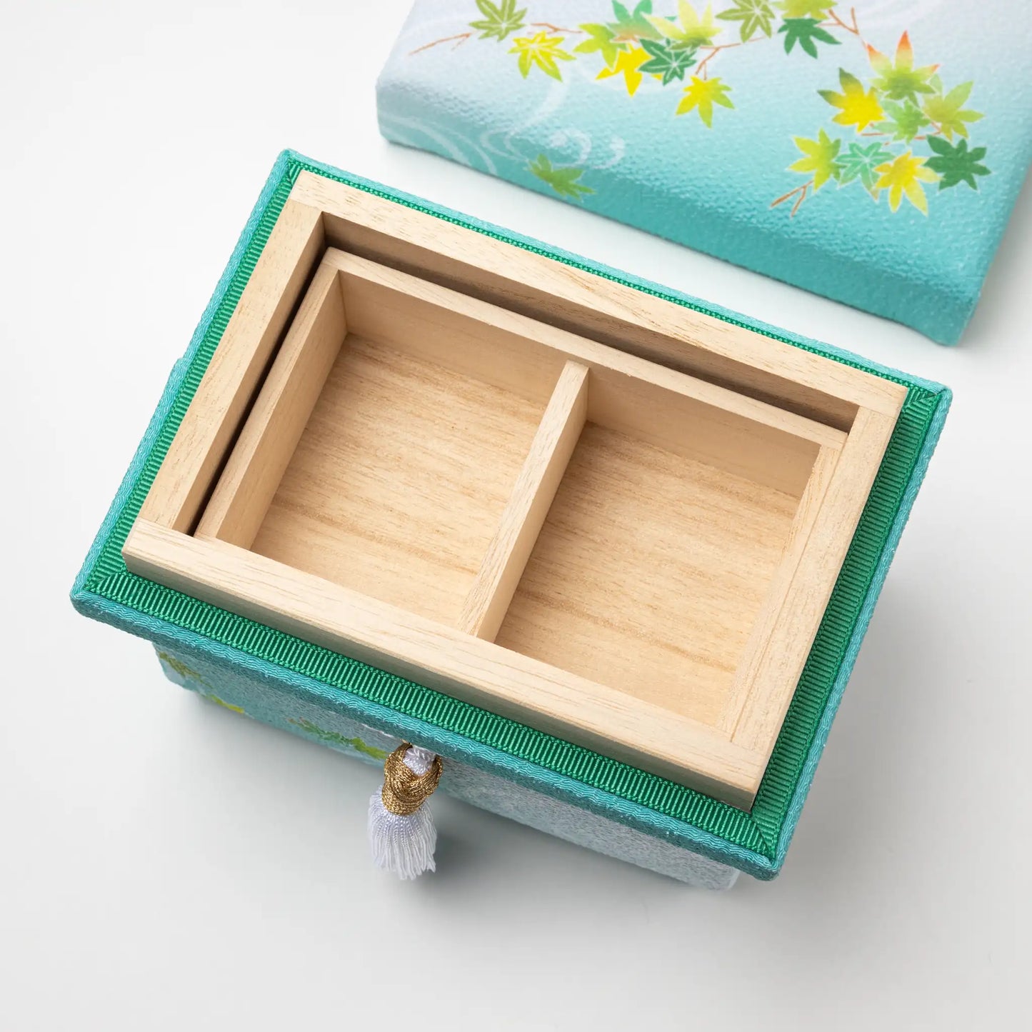 Interior view of the Kaga Yuzen Maple Leaf Accessory Box with its lid removed, showing the spacious wooden compartment divided into two sections for storage.