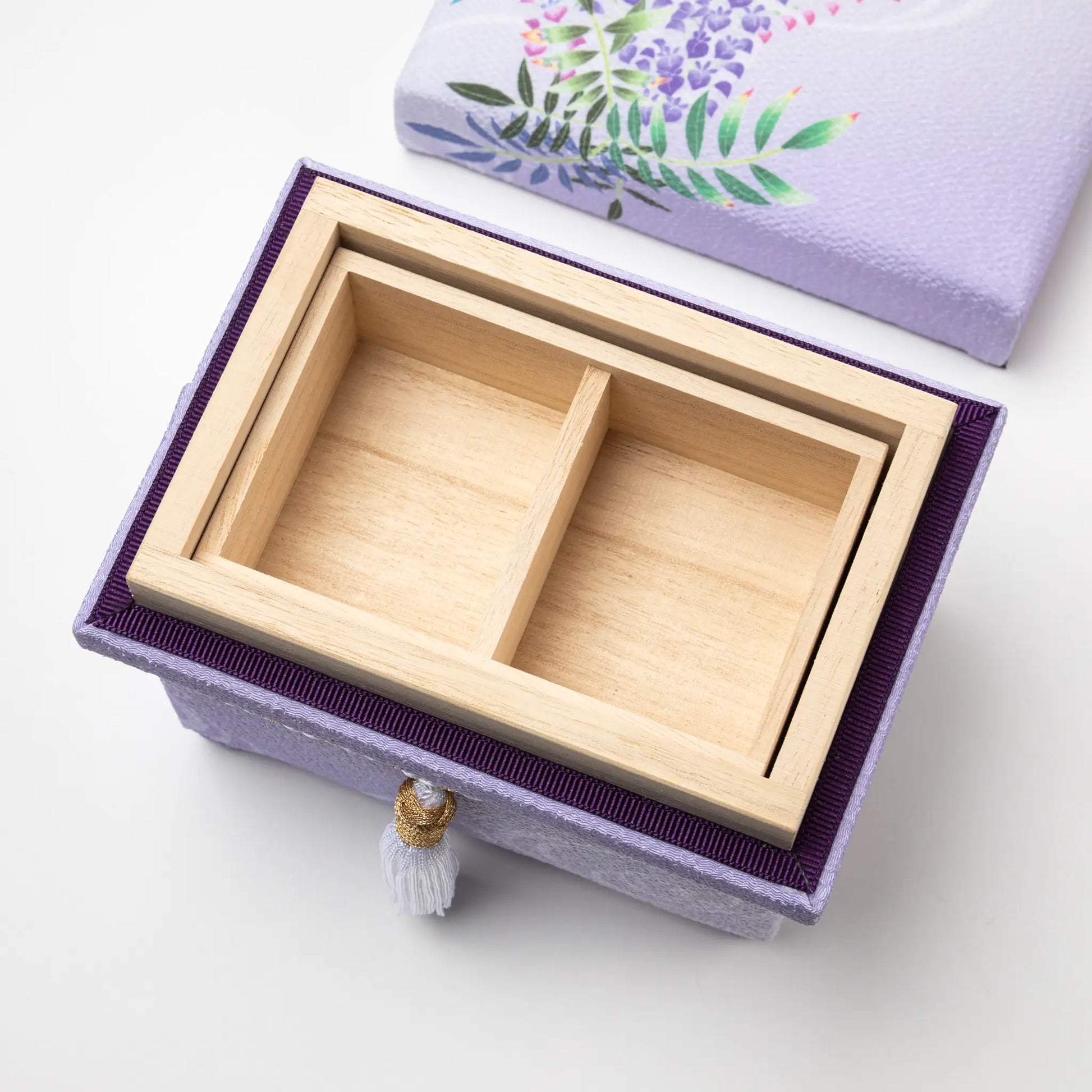 Interior view of the Kaga Yuzen Wisteria Accessory Box, revealing a wooden compartment divided into two sections, ideal for organizing small items.