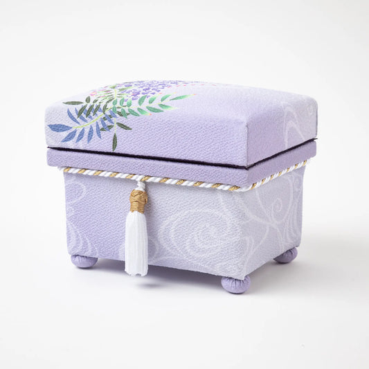 Side angle view of the Kaga Yuzen Wisteria Accessory Box, highlighting the detailed floral design and a neatly crafted tassel.