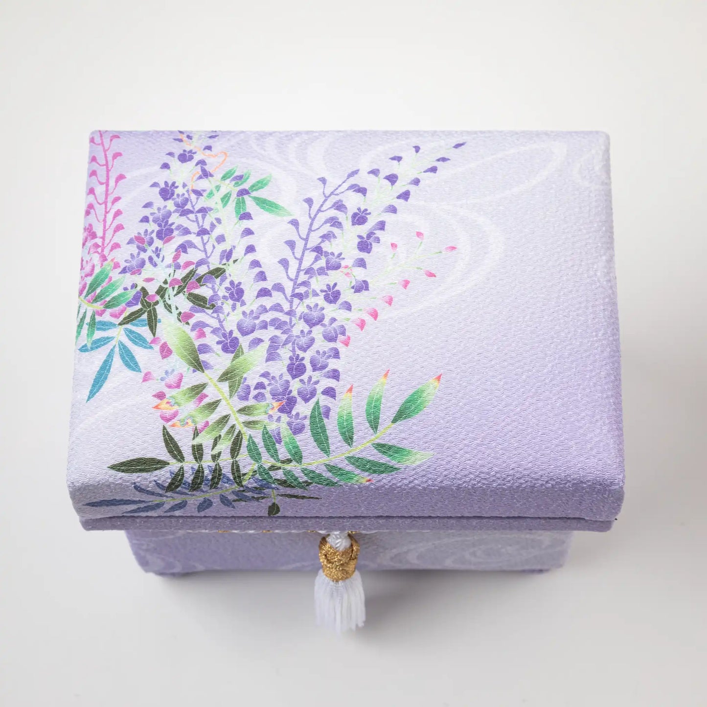 Top view of the Kaga Yuzen Wisteria Accessory Box lid, featuring vibrant wisteria flowers in shades of purple and pink on a soft lavender background.